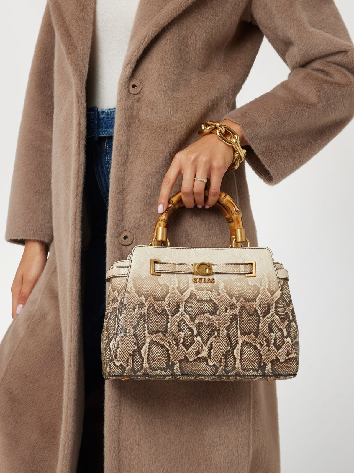 Sibel python-print handbag